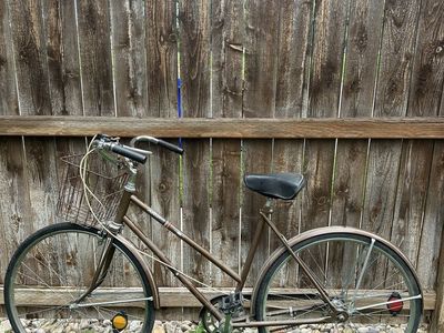 Vintage AMF step-through bicycle with basket - flat tires