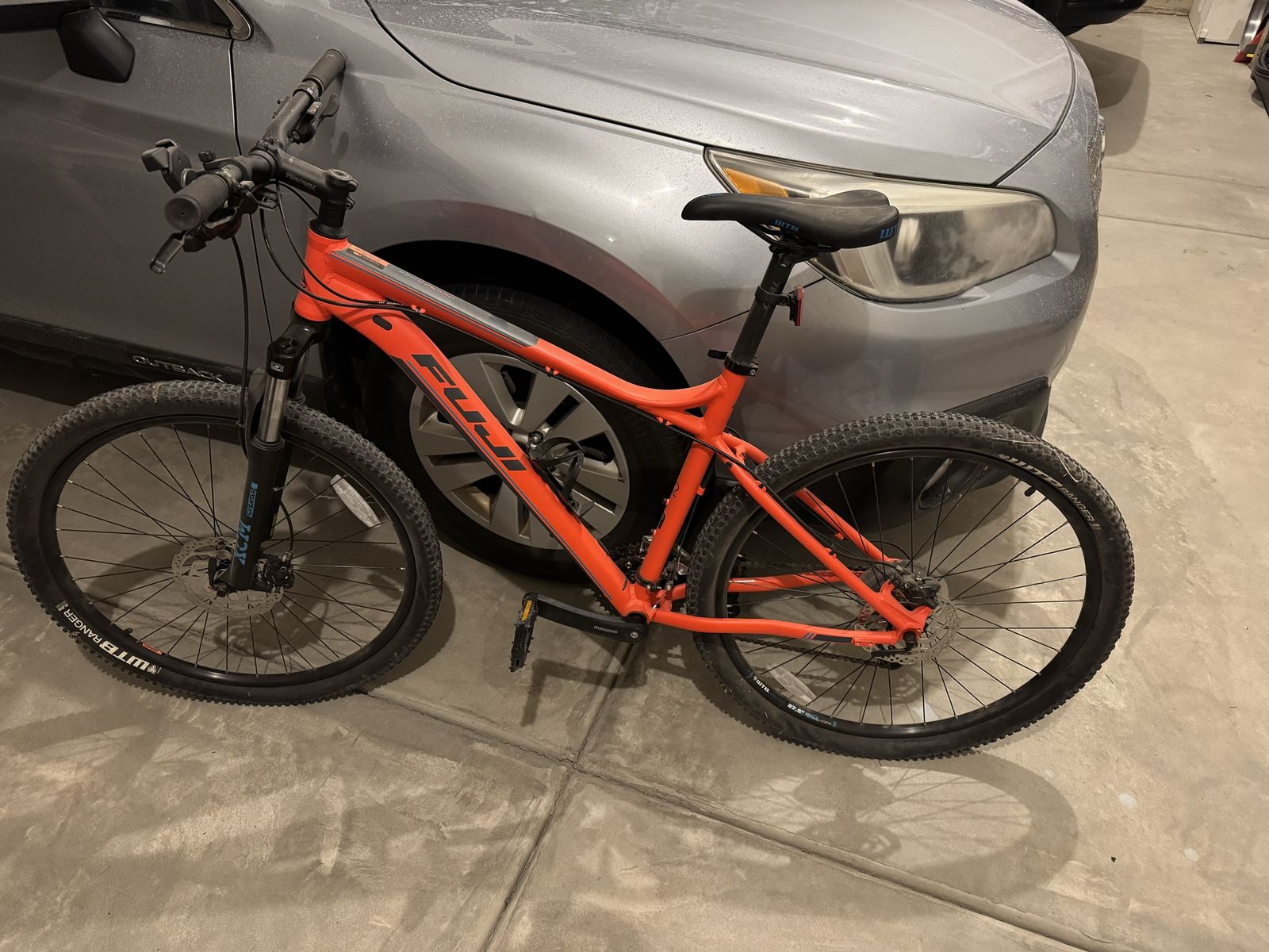 Fuji orange mountain bike.