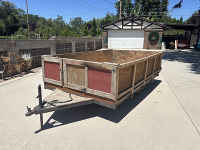 Custom Built Utility Trailer with Wooden Walls and Plywood Bed