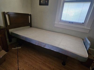 Adjustable twin bed frame, no mattress.