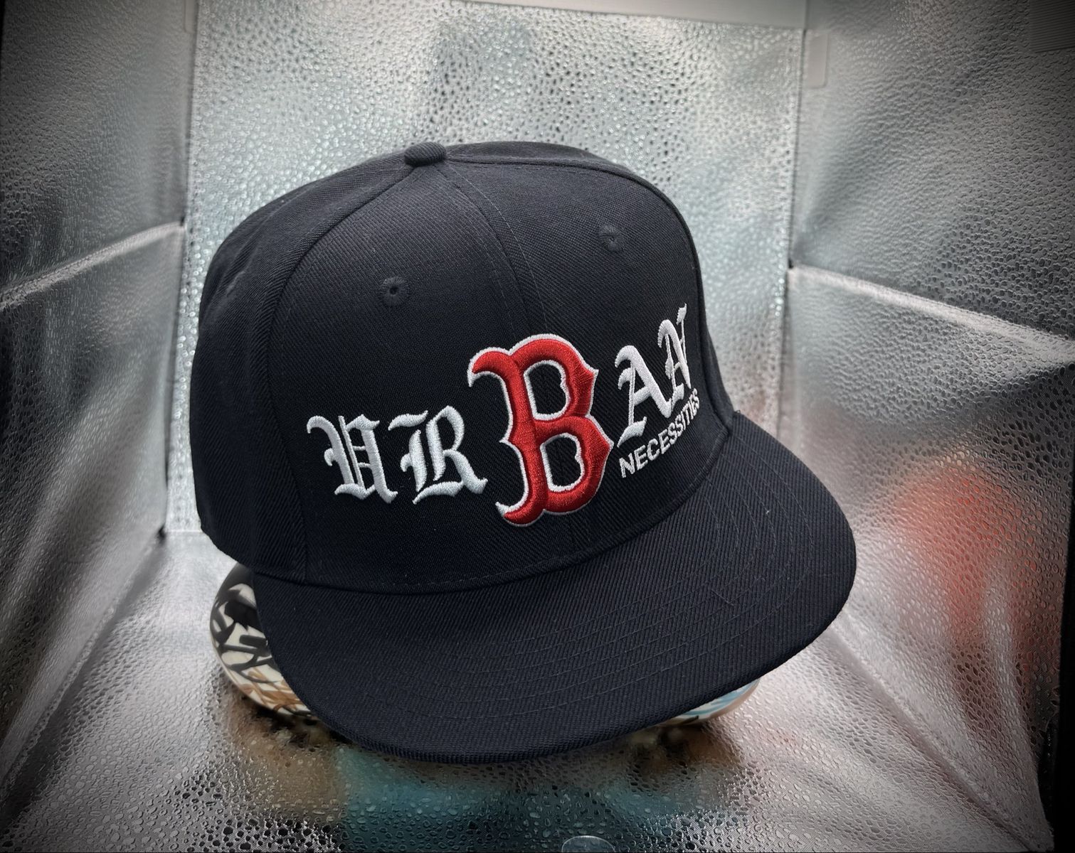 Urban Necessities Snap Back $10