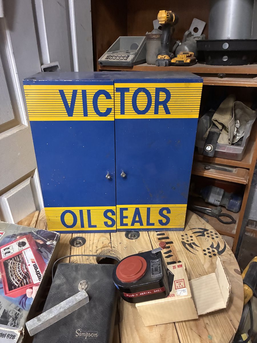 Vintage Victor Oil Seals Metal Display Cabinet with Automotive Seals