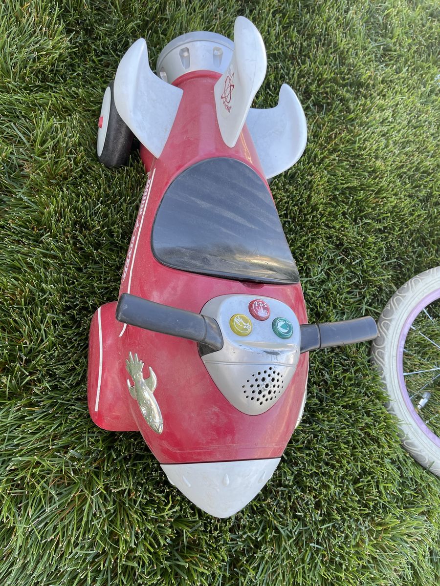 Radio Flyer Red Rocket Ride-On Toy with Sound Effects and Handlebar