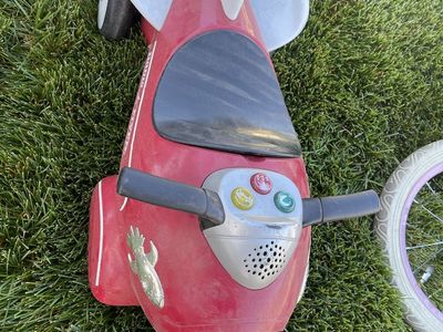 Radio Flyer Red Rocket Ride-On Toy with Sound Effects and Handlebar