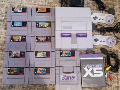 Super Nintendo game bundle with ever drive
x5