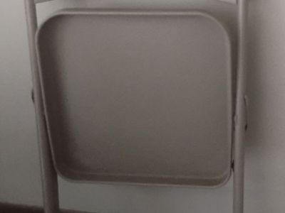 Beige Metal Folding Chair