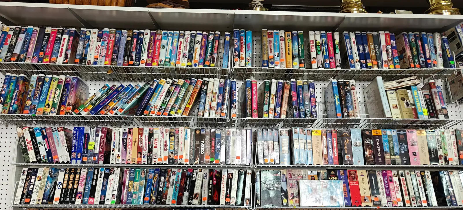!!Thrift store for sale!!, wide range of clothing, dishes, VHS tapes, shelves, and more.