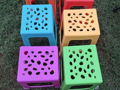 Set of 6 Colorful Stackable Plastic Stools with Cutout Pattern