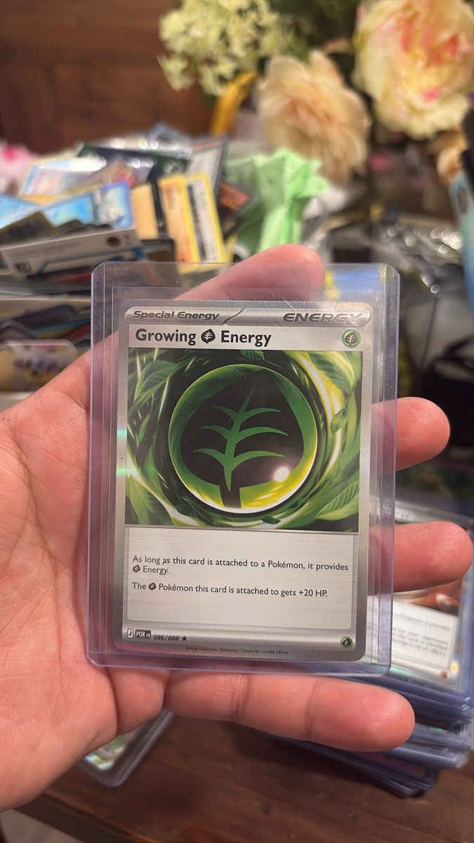 Growing Grass Energy Pokemon card