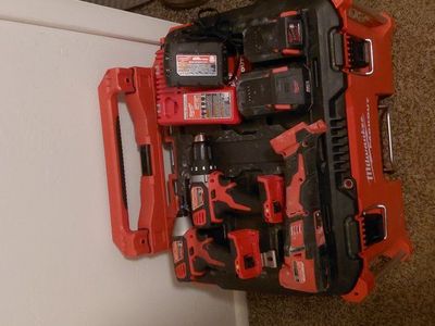 milwaukee pack out w/ drills and multi tool.