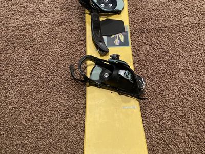 Burton Yellow Snowboard with Mounted Black Snowboard Bindings
