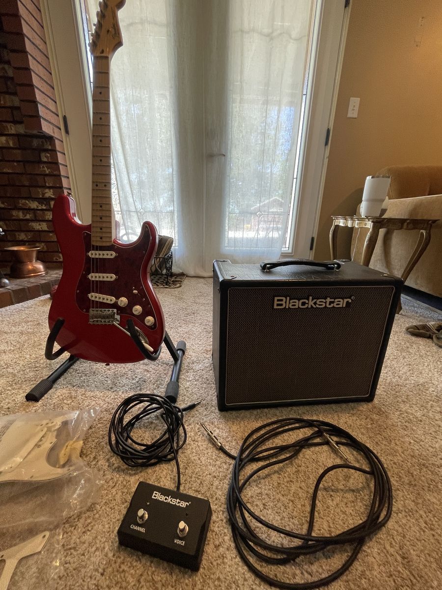 Rad Red Fender Stratocaster and Tube Amp