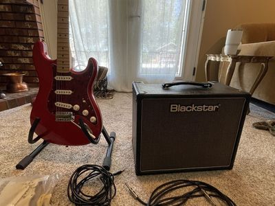 Rad Red Fender Stratocaster and Tube Amp