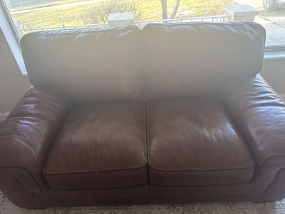 Leather Love Seat.
