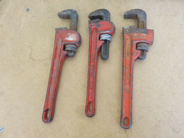 SELLLING AS A SINGLE LOT - THREE 10 INCH PIPE WRENCHES FOR LESS THAN THE COST OF ONE OF THEM.