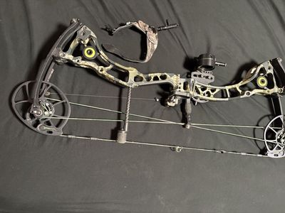 CP28 Bowtech bow/HHA sight/drop rest/release