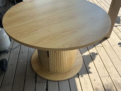 Expandable Dining Table in Natural Wood