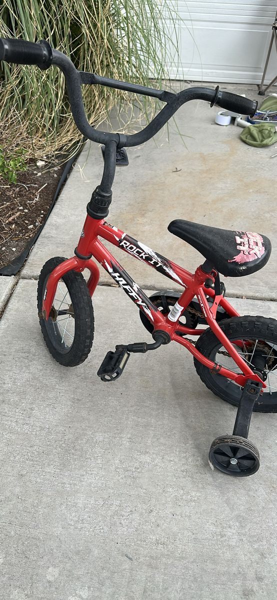 Huffy Rock It Red Kids Bicycle with Training Wheels - Used Good Condition