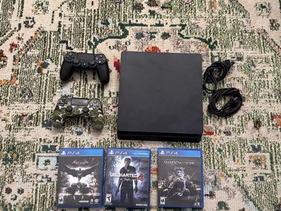 PS4 Slim w/ Controllers and Games