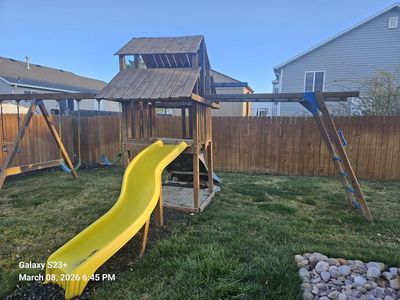 Childrens Swing, climbing, rope, rings, and treehouse play set
