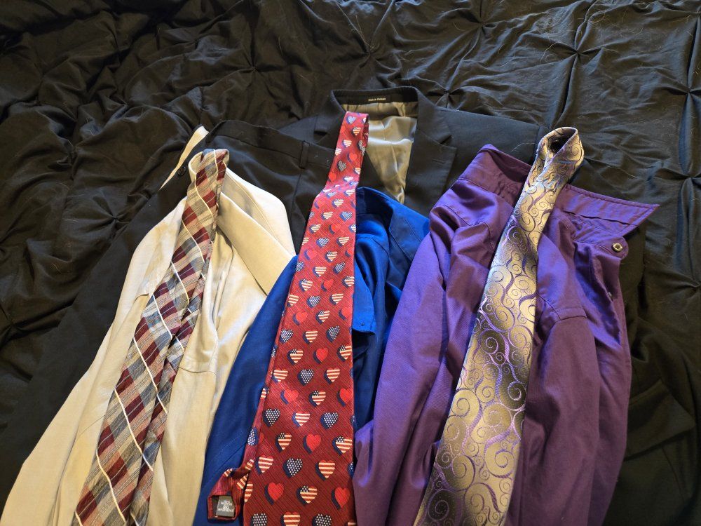 Men's Warehouse suit.