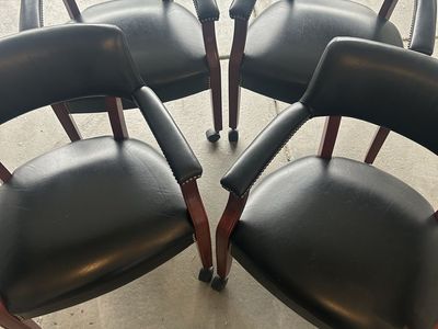 Set of four faux leather/wood rolling office chair