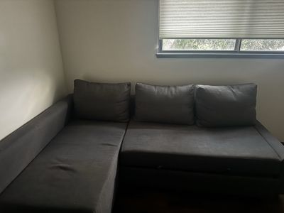 Dark Grey Fabric L-Shaped Sectional Sofa with Convertible Pull-Out Sleeper