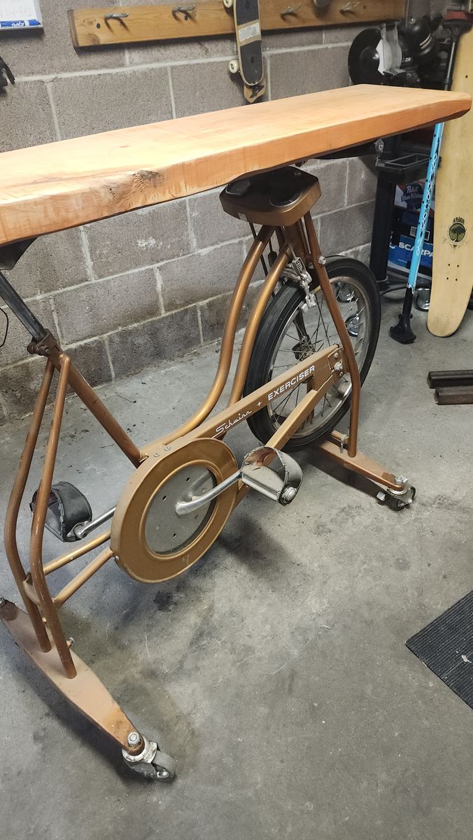 Bicycle Art bar/table using schwinn exercise bike as base with caster wheels