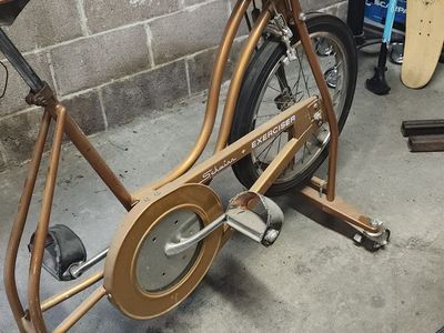 Bicycle Art bar/table using schwinn exercise bike as base with caster wheels