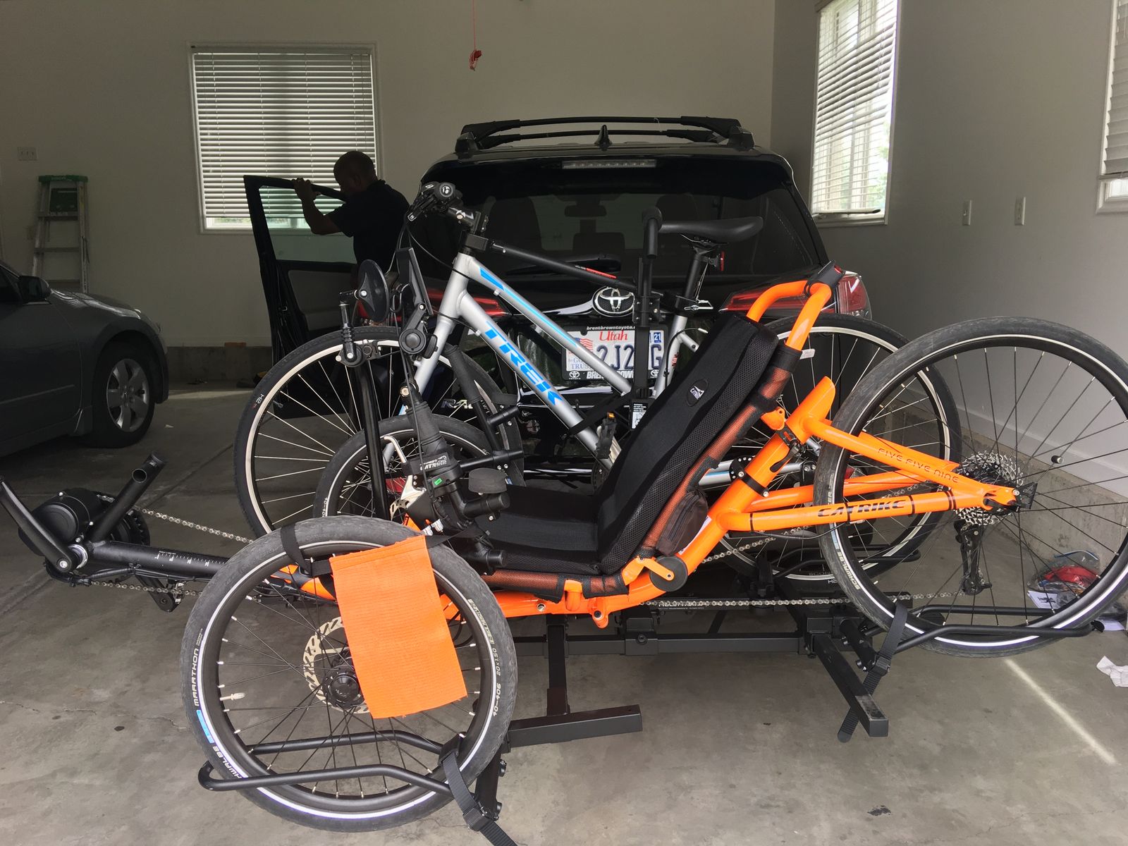 Hitch mounted bike rack for one recumbent bike and one upright bike. Securely mounts both bikes and is easy to use.