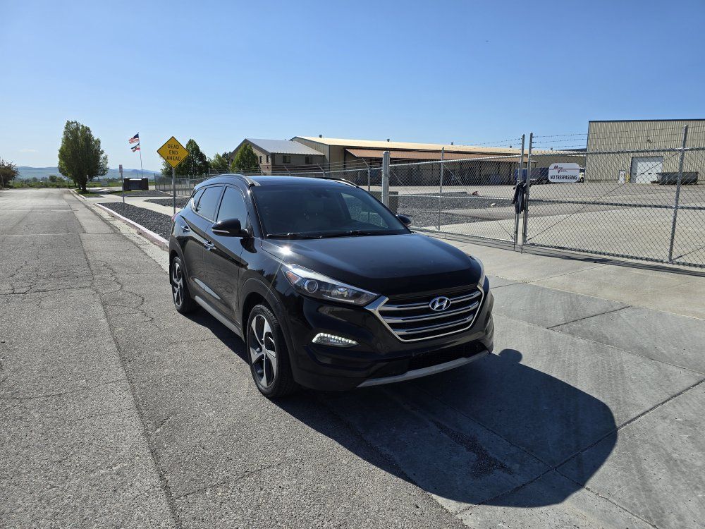 2017 Hyundai Tucson Limited — rebuilt & branded title, 13% below market