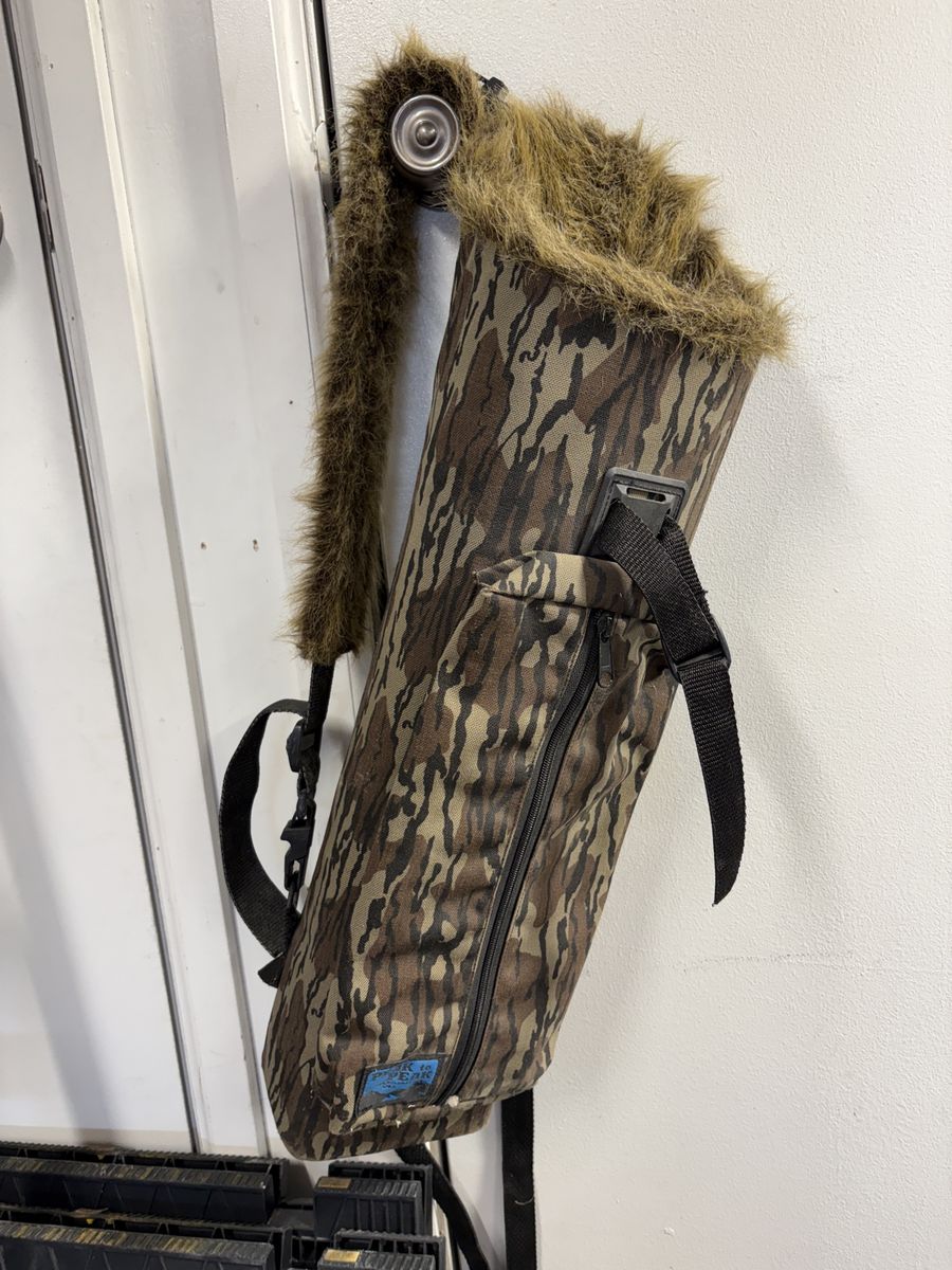 Peak to Peak Camo Back Quiver with Faux Fur Lining and Zippered Accessory Pocket