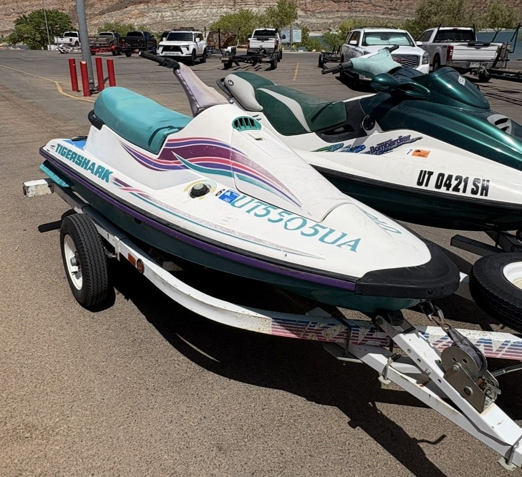 1997 Sea Doo GTX and 1995 Artic Cat Tiger shark for sale. Includes trailer.