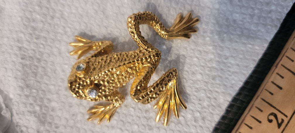 Vintage St. John gold-tone frog brooch with clear