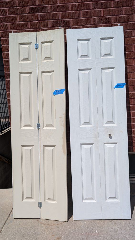 Pair of Used Bi-Fold Closet Doors - White/Off-White, 23.5" x 78.75" each