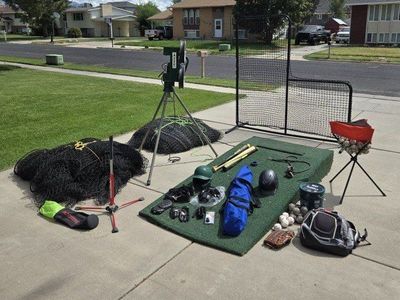 ATEC Casey Pro Baseball Pitching Machine Training Bundle with Batting Cage Nets and other items.