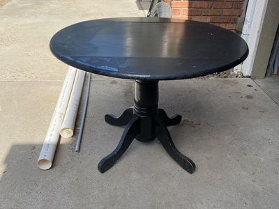 Black Round Pedestal Dining Table - comes with two matching black chairs..