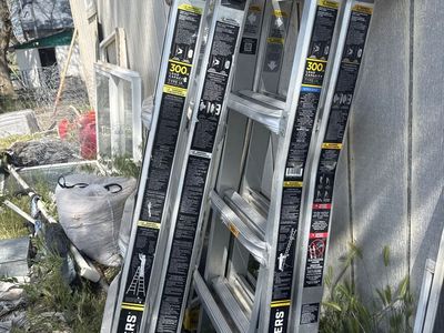 Two gorilla collapsable ladders.