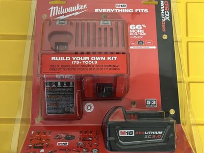2 M18 Milwaukee 5.0 batteries and Chargers