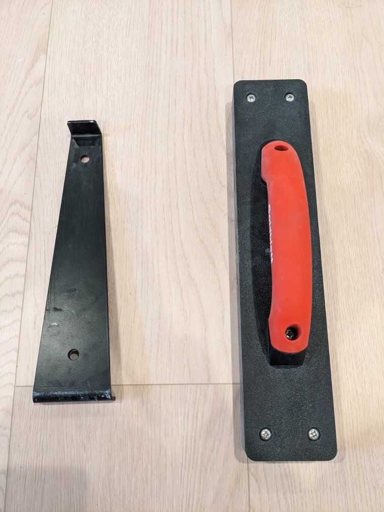 Tapping block and pull bar set for floor installation