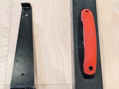 Tapping block and pull bar set for floor installation
