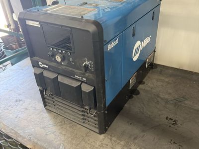 Miller 265 bobcat welder