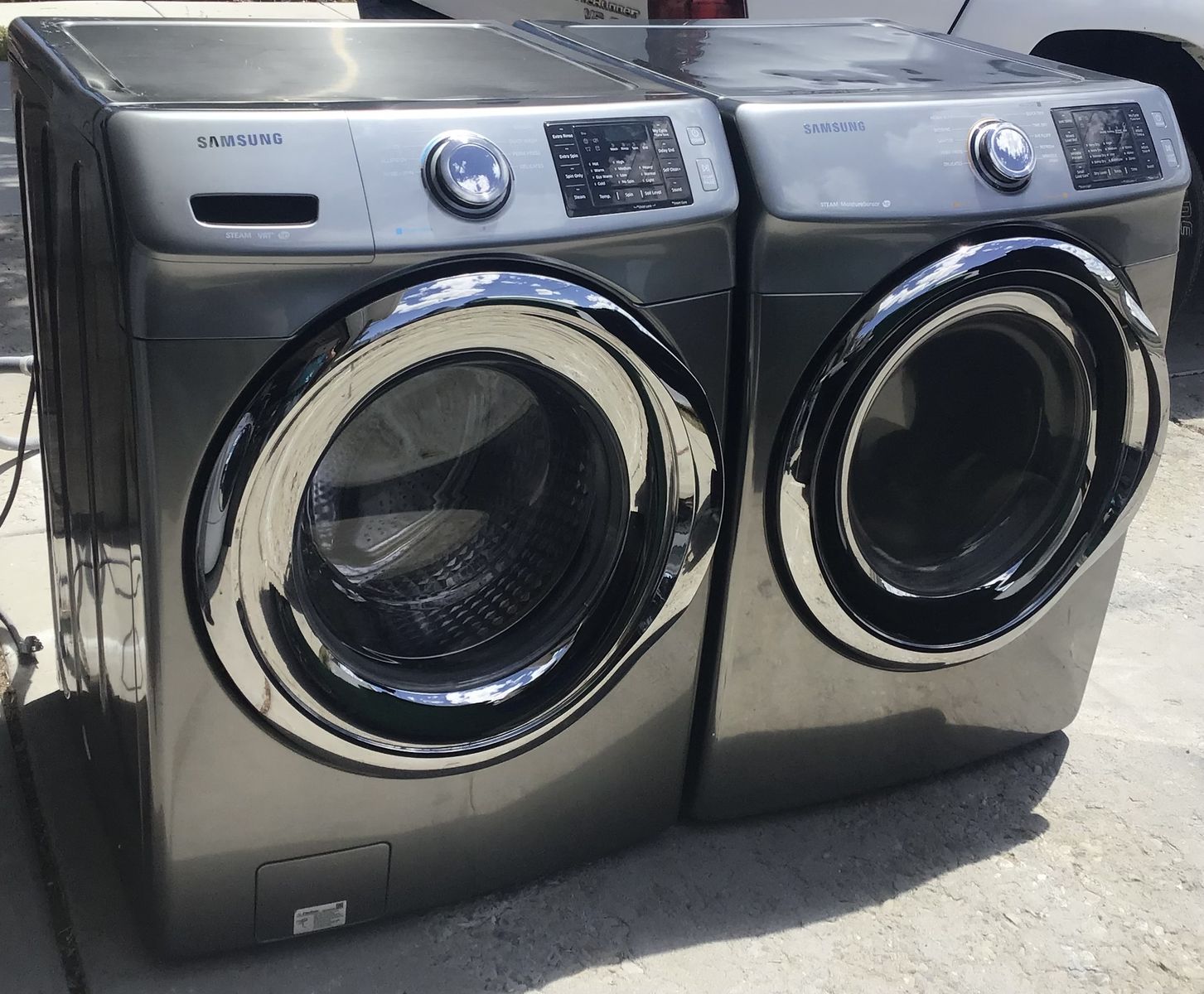 BEAUTIFUL STACKABLE/SIDE BY SIDE FRONT LOAD STEAM WASHER AND DRYER SET IN EXCELLENT CONDITION INCLUDES FREE  DELIVERY