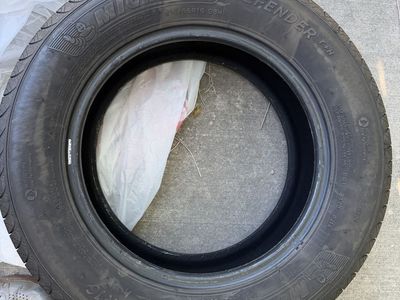Four 215/65r16 Michelin defender for sale