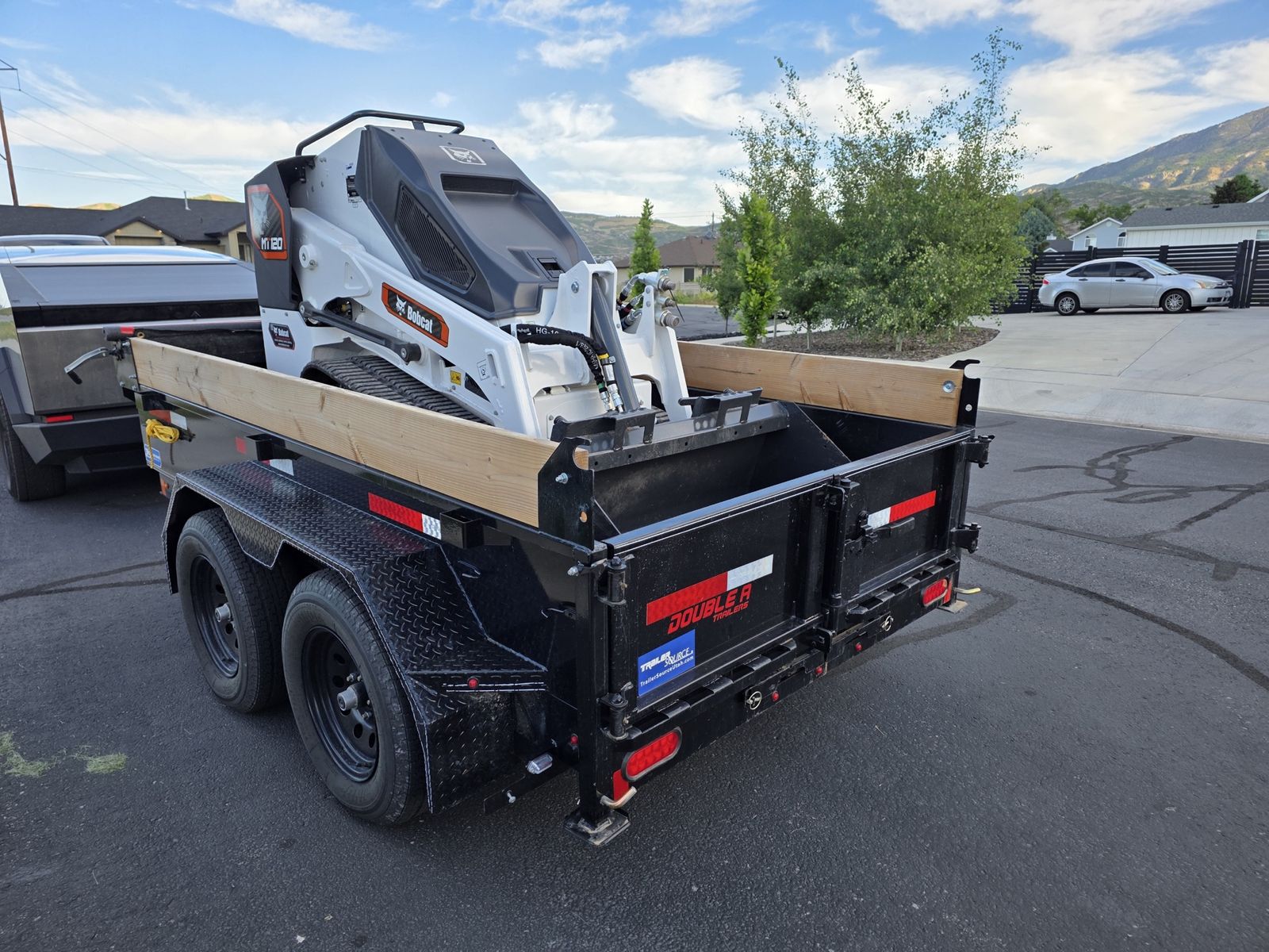 Bobcat MT120 and dump trailer for rent 
