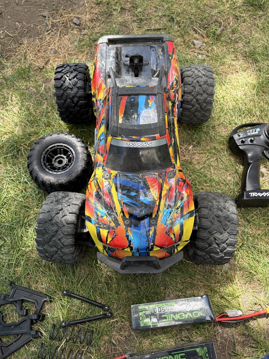 Traxxas X-Maxx RC Monster Truck with Controller, Batteries, and Spare Parts