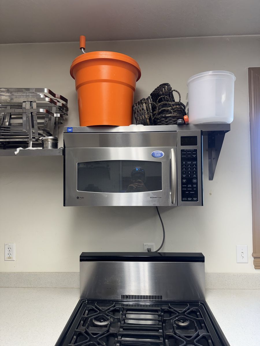 GE Profile Spacemaker Over-the-Range Stainless Steel Microwave
