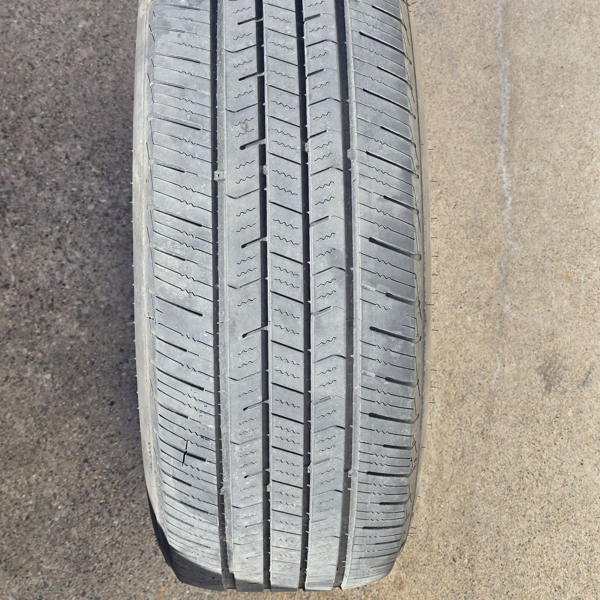 225 60 R17 Tire has a rock in it...