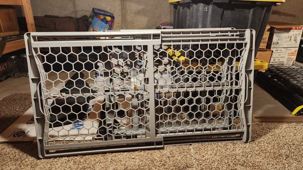 Grey expandable pet gates