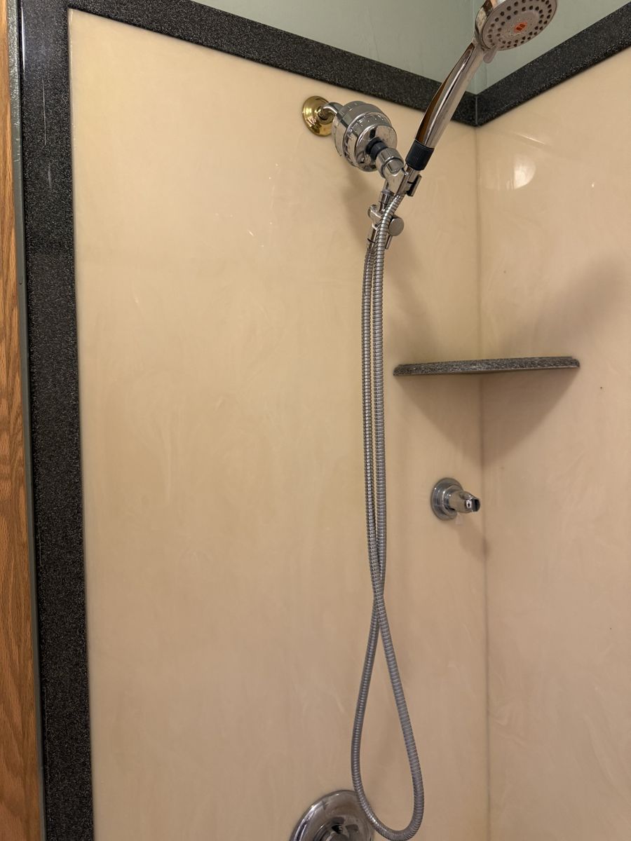 Corian shower surround.